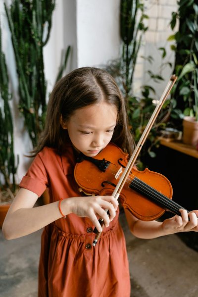 Child playing instrument