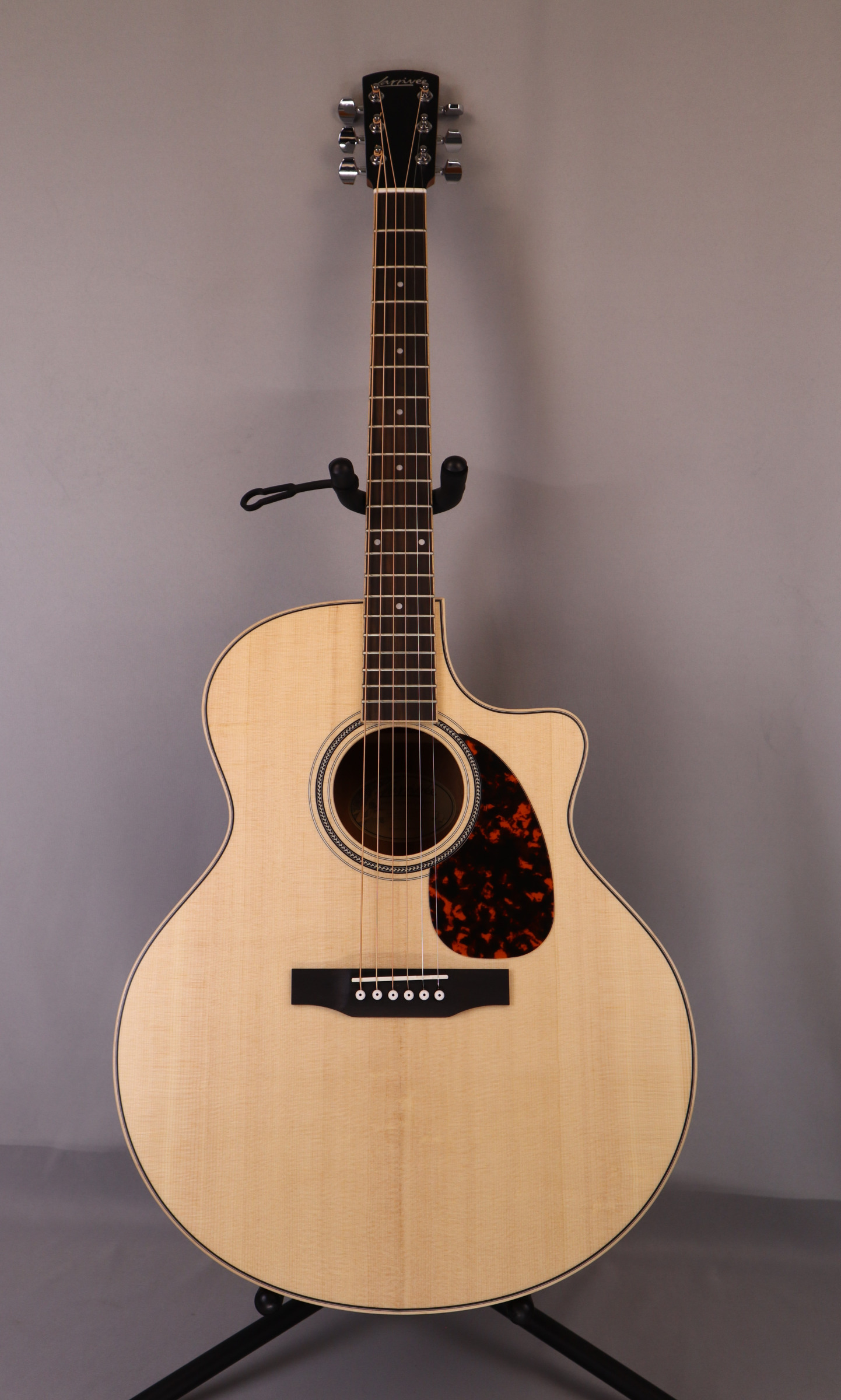 Larrivee JV-03-MH: Jumbo with Cutaway. Solid Sitka Spruce Top, Solid Mahogany back and sides.