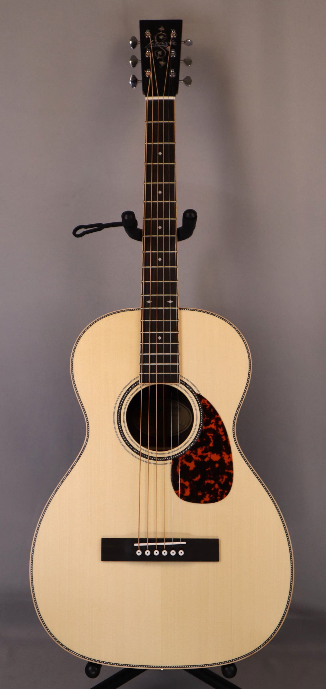 Larrivee OO-40-RW Custom: Solid Moon Spruce Top, Solid Indian Rosewood back and sides. Vine Logo